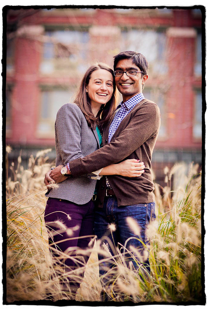 Engagement Portraits: Katie & Sharmilan share a hug in their neighborhood, Chelsea.