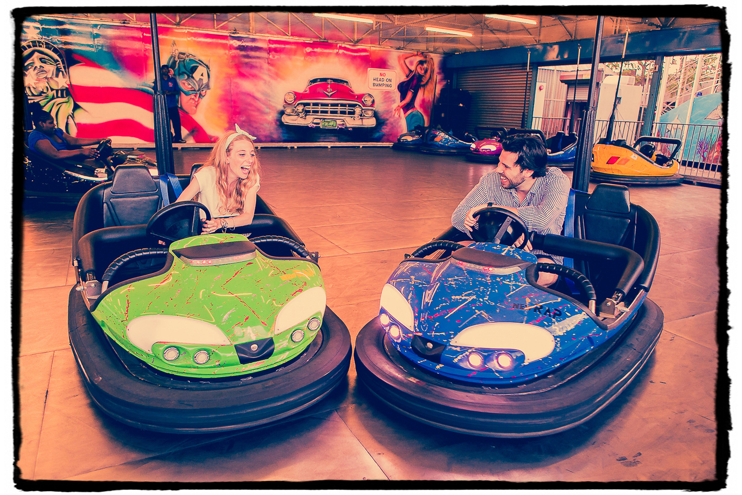 Engagement Portraits: Jaymie & Brad on the bumper cars at Coney Island.