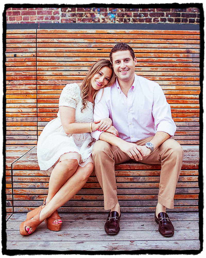 Engagement Portrait: Rorie & Adam snuggle up on a bench at High Line park.