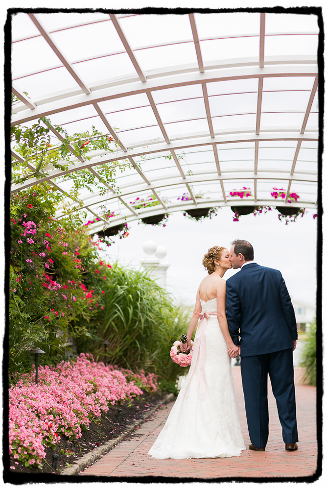This little walkway at Bonnet Island Estate with soft pink flowers provided a beautiful framing device for a walking shot of Kelly and Scott.