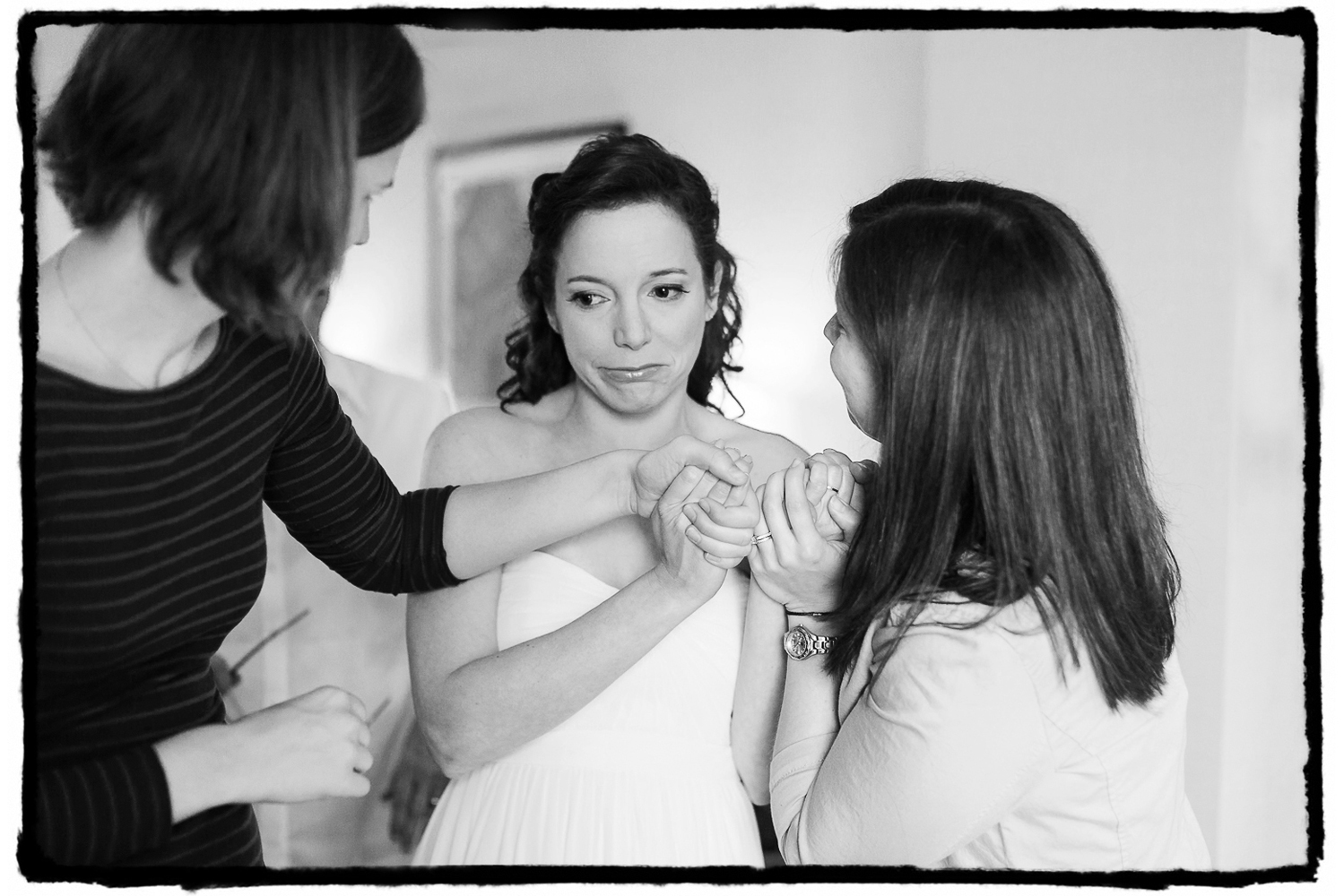 Julie shares an emotional moment with her bridesmaids as it hits her that this is really the day of her wedding at Battery Gardens.