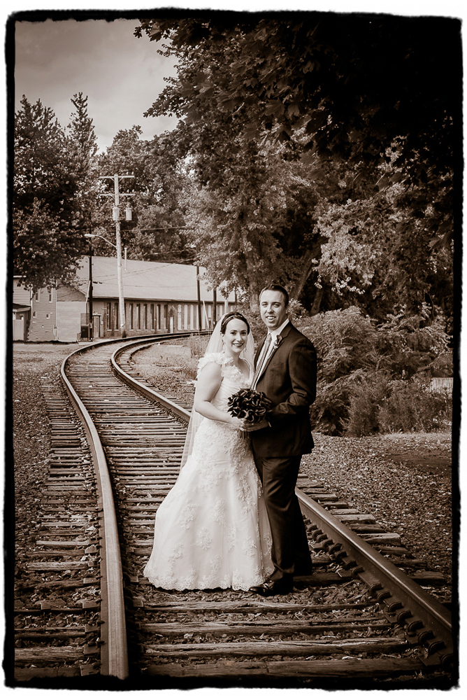 I love how this portrait on the abandoned railroad by the Roundhouse at Beacon Falls looks in Sepia tones.  Sometimes I prefer a straight black and white, but sometimes the warmth of that added touch of brown really fits with a wedding's style.