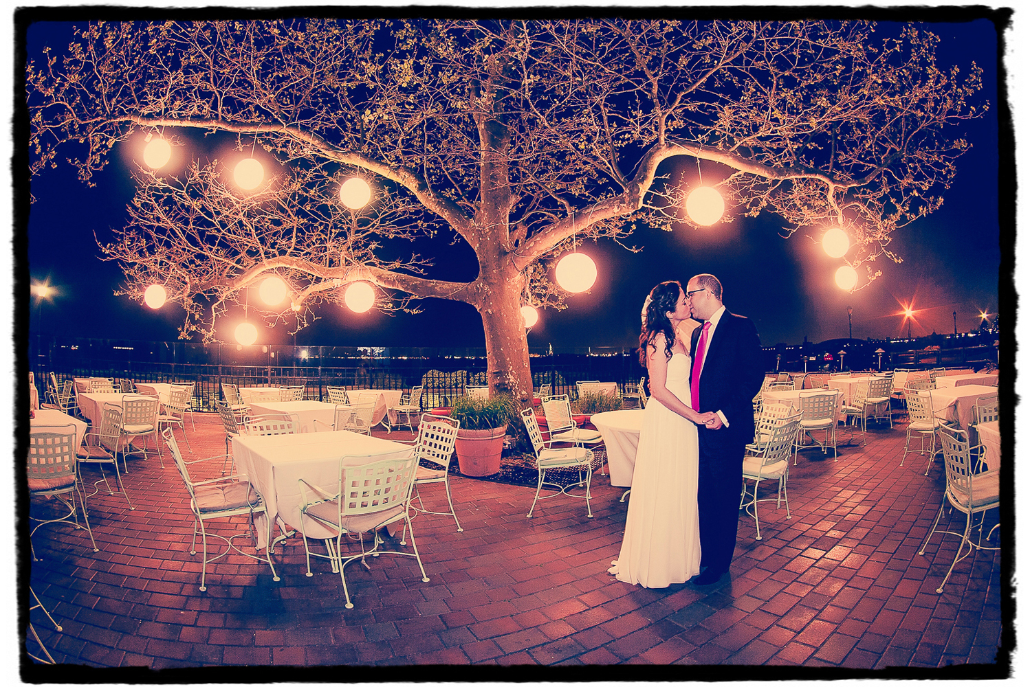 I love to sneak outside for a night portrait with couples if they are game to leave the reception for a quick few minute at some point.  Julie and Ryan are shown on the patio at Battery Gardens with it's lovely lanterns.