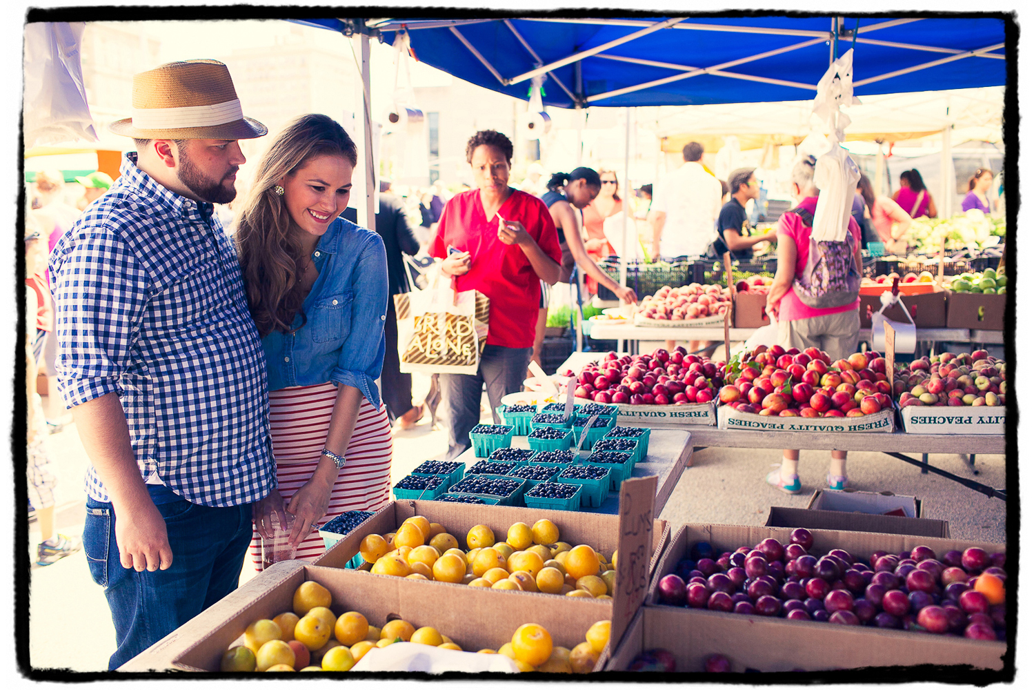 Engagement Portrait: Alexandra & Will check out the goods at the Prospect Park Farmers' Market.